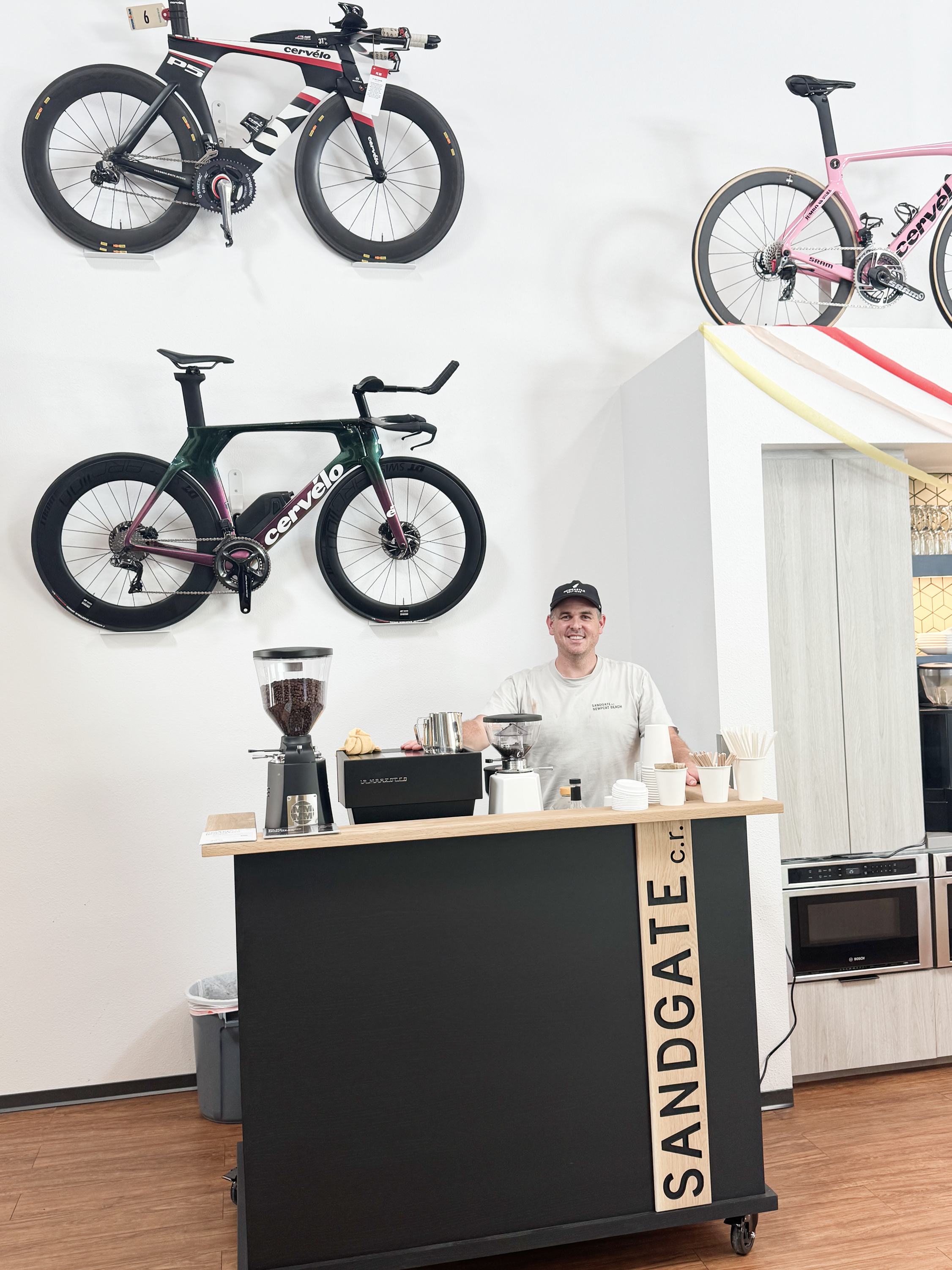 Mace at a partner café — Sandgate Coffee Roasters